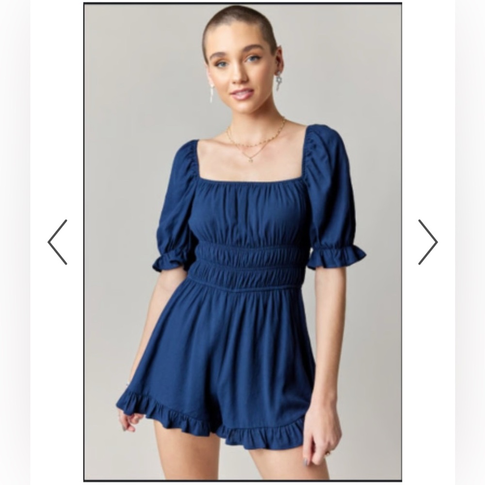 Francesca’s Navy Ruffle Romper
